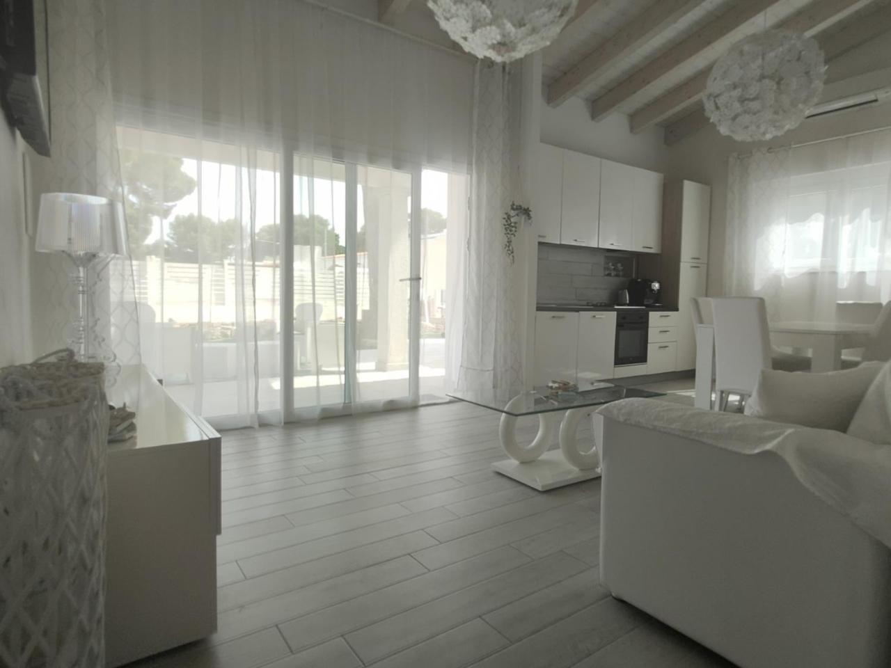 Ikebana Villas Porto Pino Beach Esterno foto