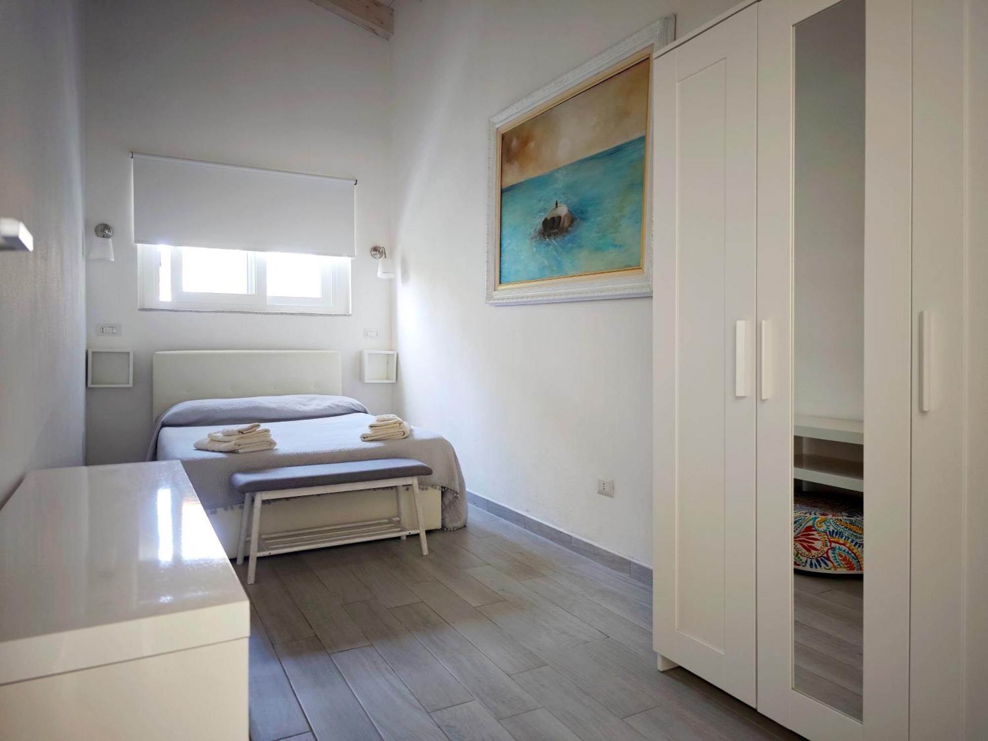 Ikebana Villas Porto Pino Beach Esterno foto